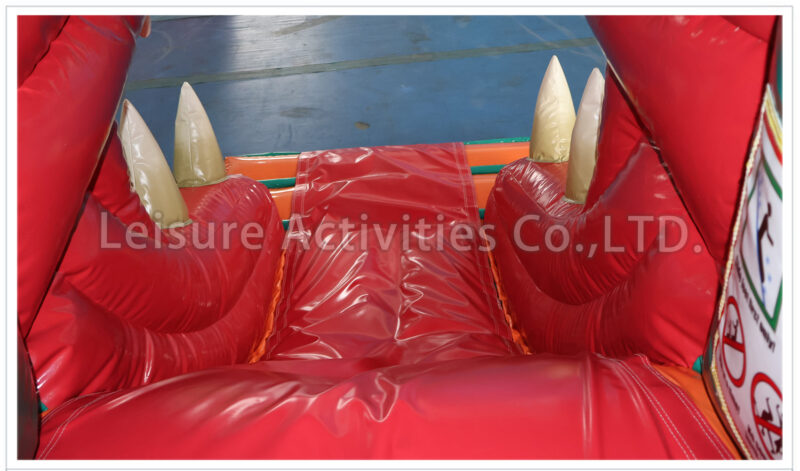 t rex bouncy castle with slide